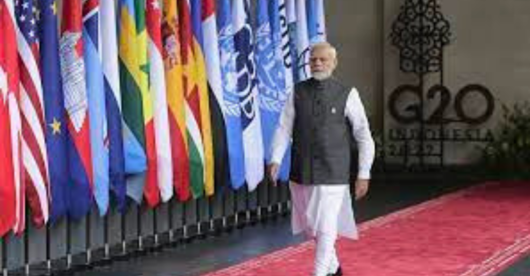 Prime Minister Narendra Modi Walking Past G20 Flags, Signifying India's Global Leadership in Renewable Energy