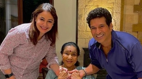 Sachin Tendulkar and his wife Anjali with Asha Bhosle